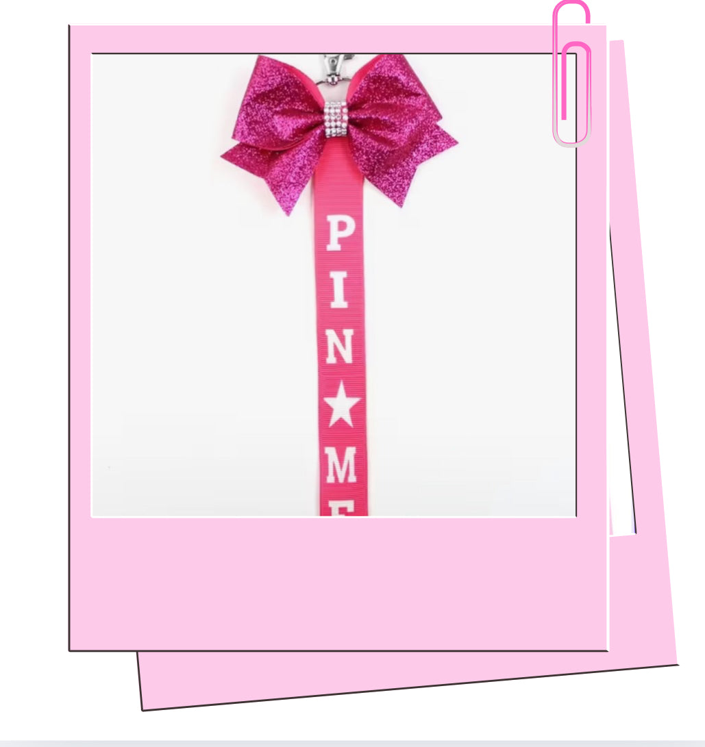 Pink pin me bag charm