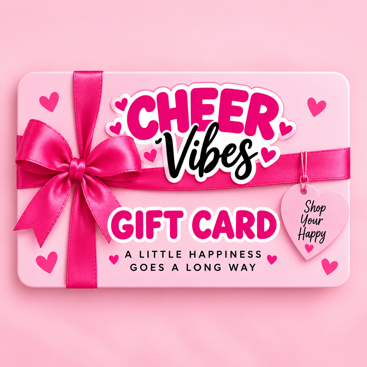 A pink gift card with a bright pink ribbon and bow, decorated with small hearts and the text 'CHEER Vibes GIFT CARD' and 'A LITTLE HAPPINESS GOES A LONG WAY' on a matching pink background.