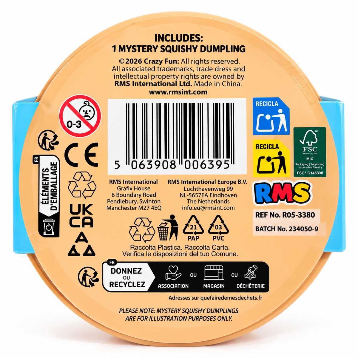 The back of a circular mystery squishy dumpling package, showing a beige label with barcode, recycling symbols, EU disposal markings, and RMS International Ltd. text and logos, with blue packaging visible on the left and right edges.
