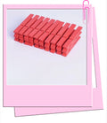 Red wooden pegs