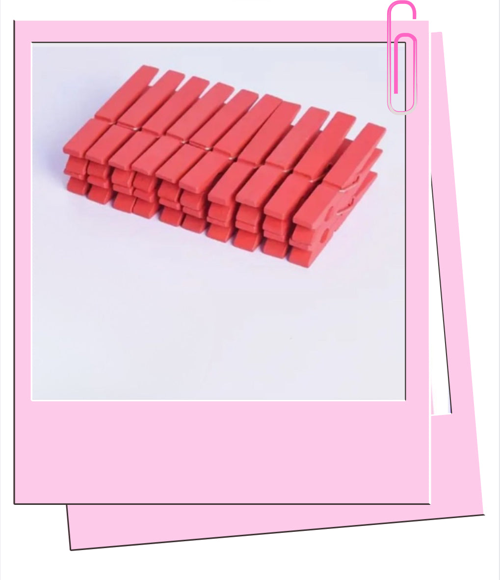 Red wooden pegs