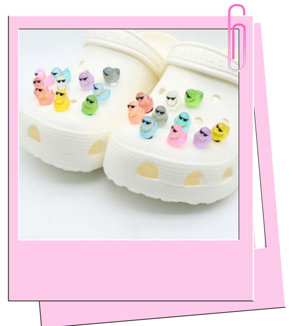 Ducks with chain croc charm