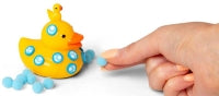 Scrunchems Sticky Squishy Duck being squeezed to show its soft texture