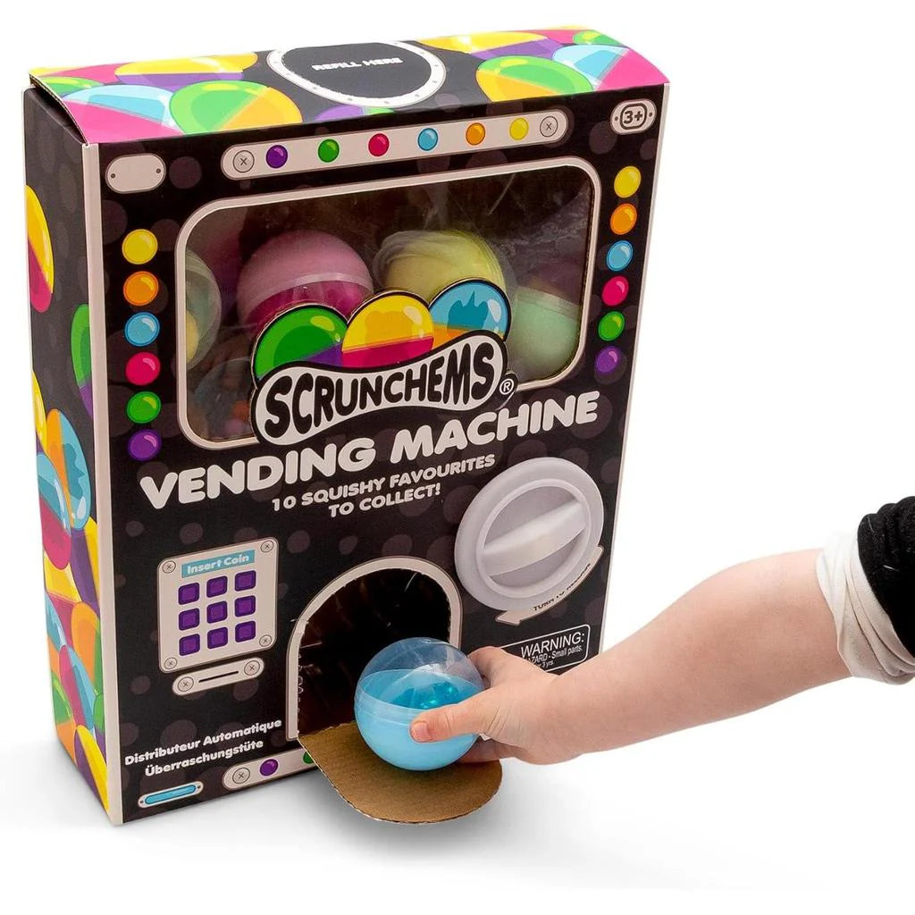 Scrunchems mystery capsule vending machine dispensing a blue surprise capsule