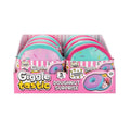 GiggleTastic Doughnut Surprise 5 Pack assorted pink and turquoise doughnut-shaped toy cases containing five mystery mini squishies per case; photo shows supplier display